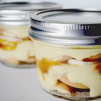 Caramel banana pudding in small mason jar