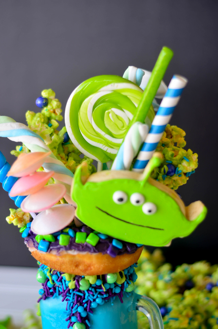I was so excited when a few of us decided to have a Pixar Fest inspired Freak Shake Blog Hop! One of my favorite Pixar characters is the Little Green Alien from Toy Story so I had to make this Toy Story Green Alien Freak Shake.