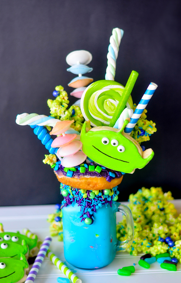 I was so excited when a few of us decided to have a Pixar Fest inspired Freak Shake Blog Hop! One of my favorite Pixar characters is the Little Green Alien from Toy Story so I had to make this Toy Story Green Alien Freak Shake.